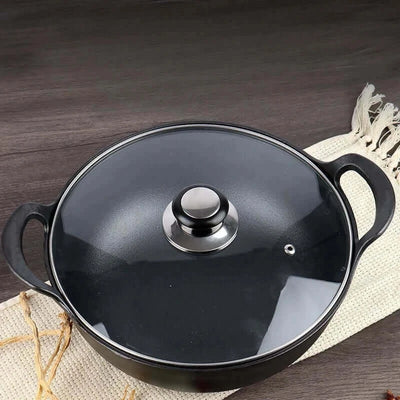 Durable cast iron stew pot with double handles—perfect for soups, stews, and stir-fries. Even heat, non-stick cooking without coating.