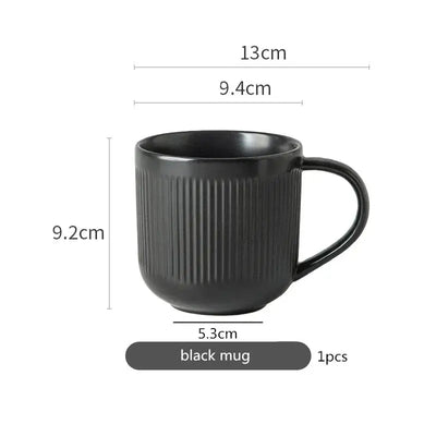 Elegant black porcelain plates with gold rim finish.