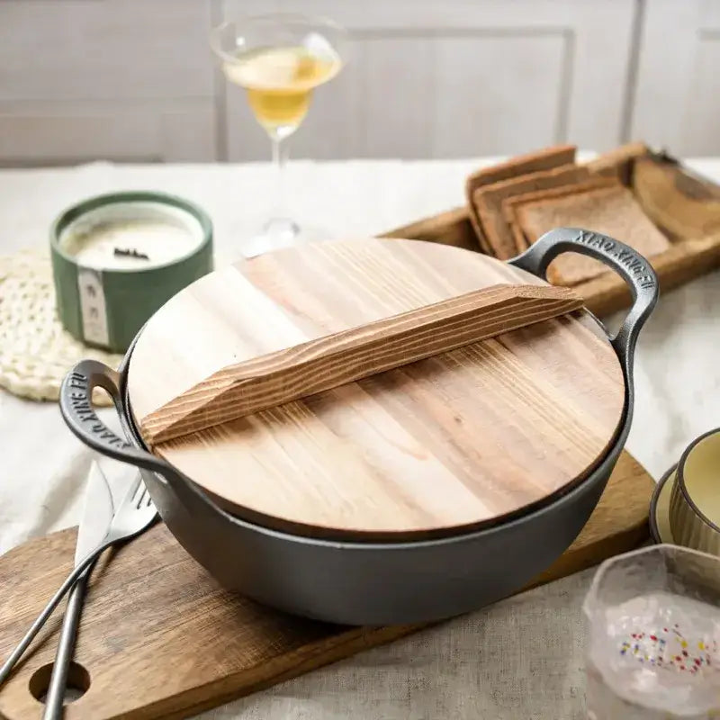 Durable cast iron stew pot with double handles—perfect for soups, stews, and stir-fries. Even heat, non-stick cooking without coating.