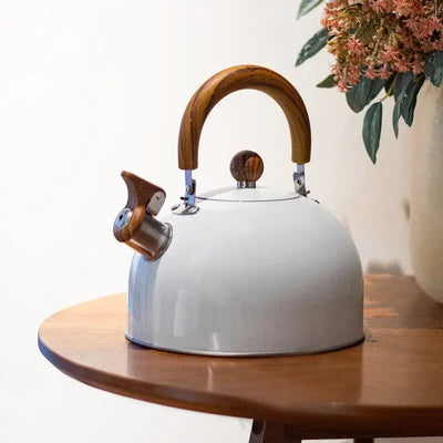 Sleek and durable, this 2.5/3L stainless steel kettle features a loud whistle, thickened base, and is compatible with gas and induction cookers.