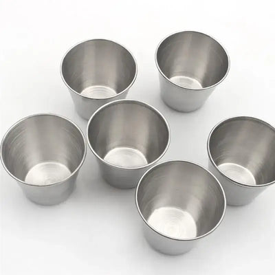 Sleek metal shot cups built to last. Use them for camping drinks, kitchen sauces, or party shots. A stylish, reusable alternative to plastic.