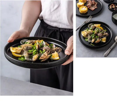Elegant black porcelain plates with gold rim finish.