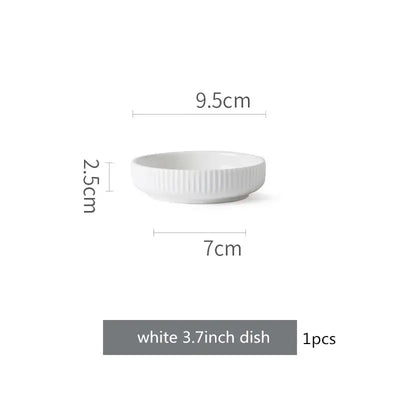Elegant black porcelain plates with gold rim finish.