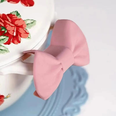 Protect your hands in style with these heat-resistant silicone oven mitts. The creative bow shape adds charm to your kitchen tools.