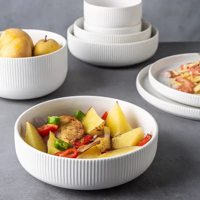 Elegant black porcelain plates with gold rim finish.
