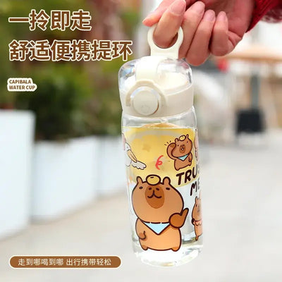 Stay hydrated in style! This 400ml Capibala cartoon cup comes with a secure lid and strap—perfect for kids on the go.