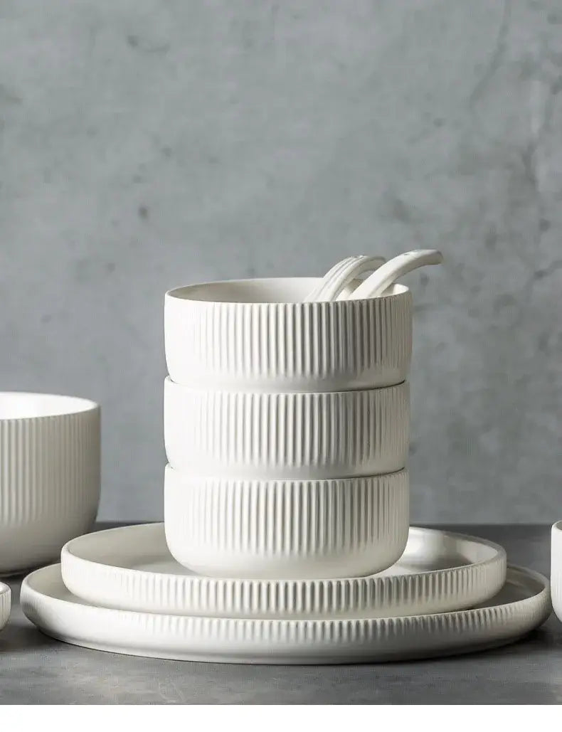 Elegant black porcelain plates with gold rim finish.