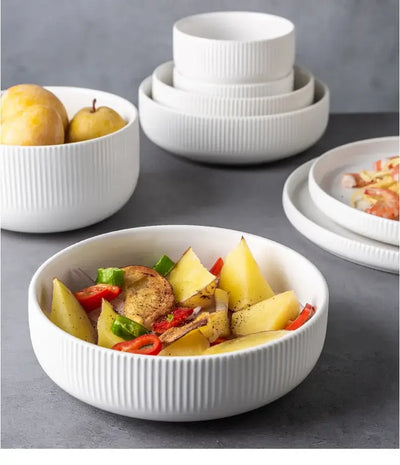 Elegant black porcelain plates with gold rim finish.