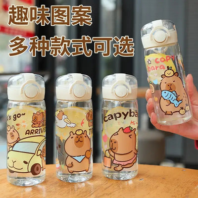 Stay hydrated in style! This 400ml Capibala cartoon cup comes with a secure lid and strap—perfect for kids on the go.