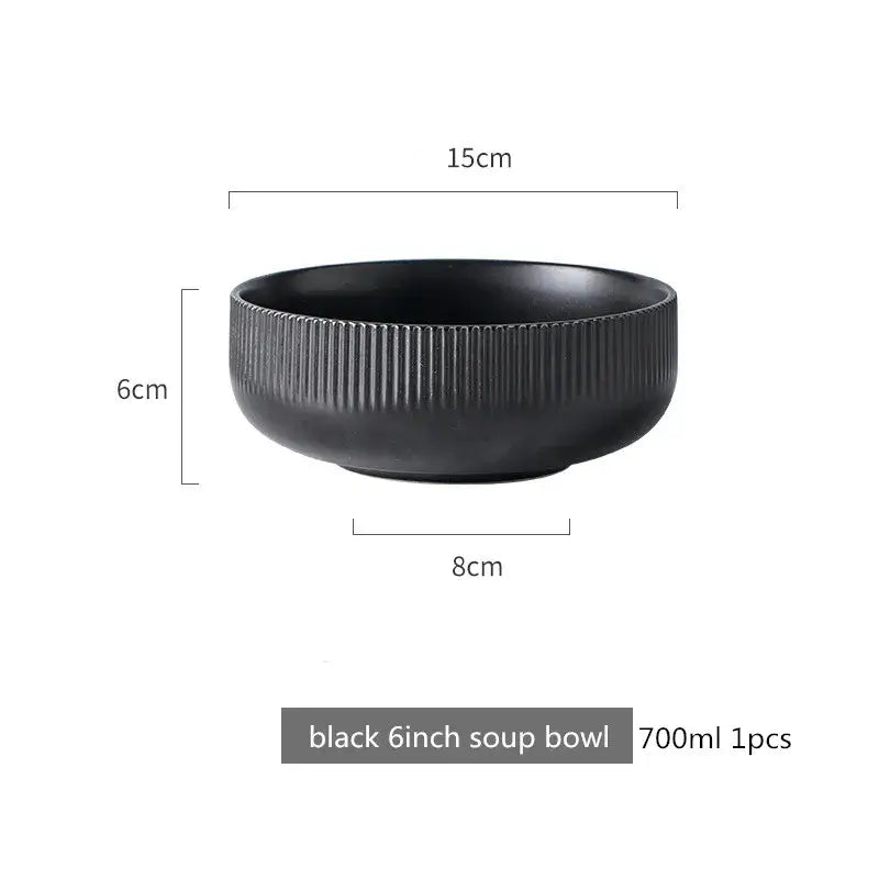 Elegant black porcelain plates with gold rim finish.