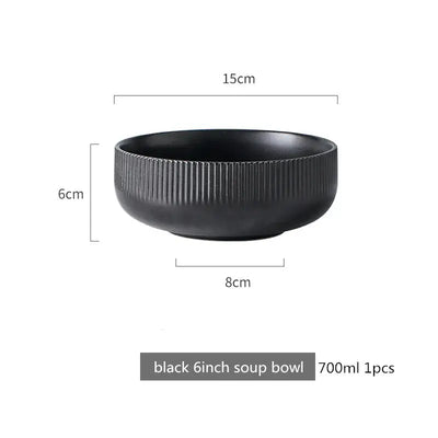 Elegant black porcelain plates with gold rim finish.