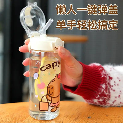 Stay hydrated in style! This 400ml Capibala cartoon cup comes with a secure lid and strap—perfect for kids on the go.