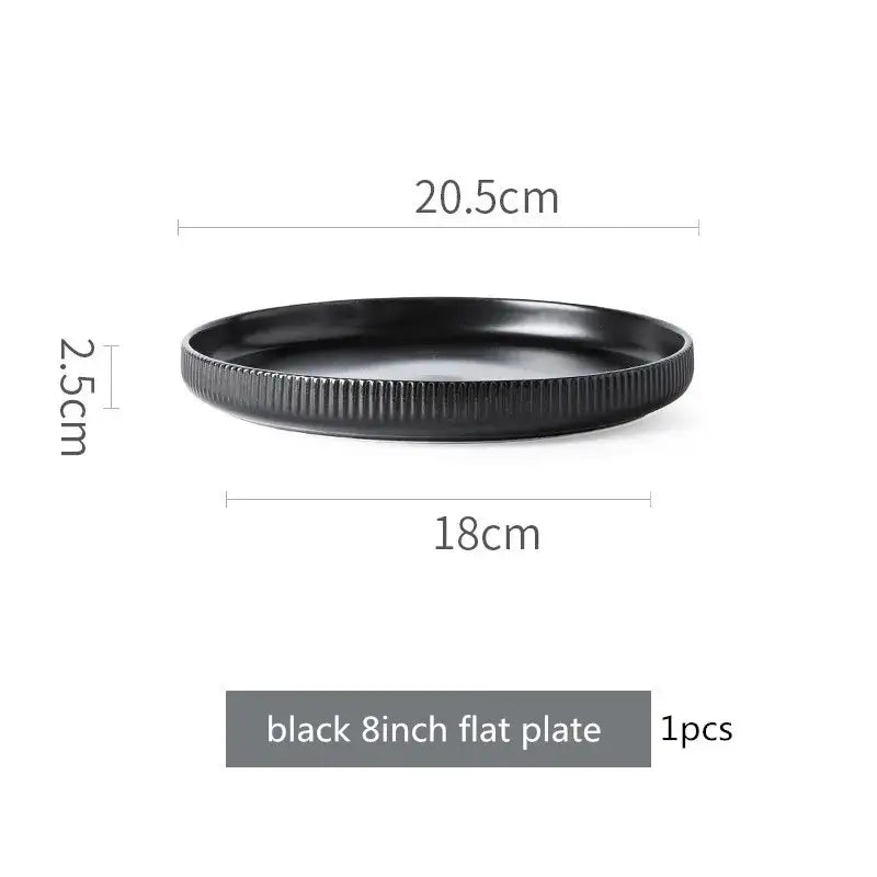 Elegant black porcelain plates with gold rim finish.