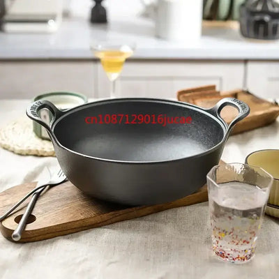 Durable cast iron stew pot with double handles—perfect for soups, stews, and stir-fries. Even heat, non-stick cooking without coating.