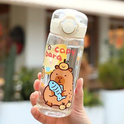 Stay hydrated in style! This 400ml Capibala cartoon cup comes with a secure lid and strap—perfect for kids on the go.
