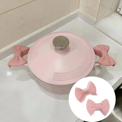 Protect your hands in style with these heat-resistant silicone oven mitts. The creative bow shape adds charm to your kitchen tools.