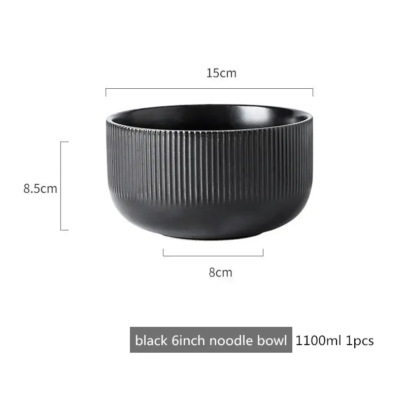 Elegant black porcelain plates with gold rim finish.