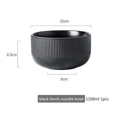 Elegant black porcelain plates with gold rim finish.