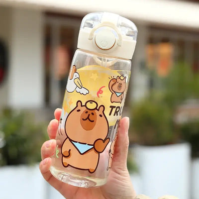 Stay hydrated in style! This 400ml Capibala cartoon cup comes with a secure lid and strap—perfect for kids on the go.