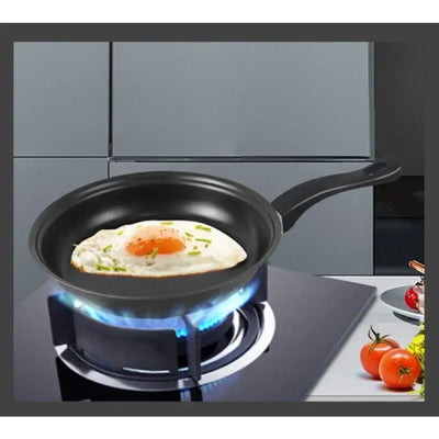 Complete kitchenware set including small frying pan and shovel
