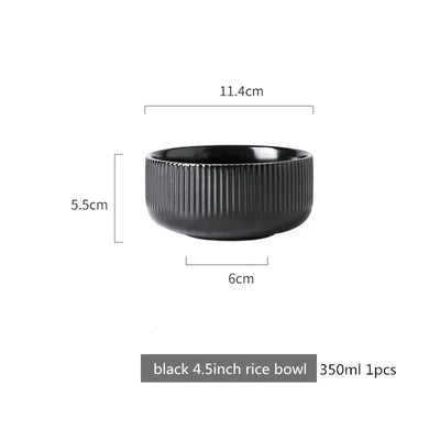 Elegant black porcelain plates with gold rim finish.