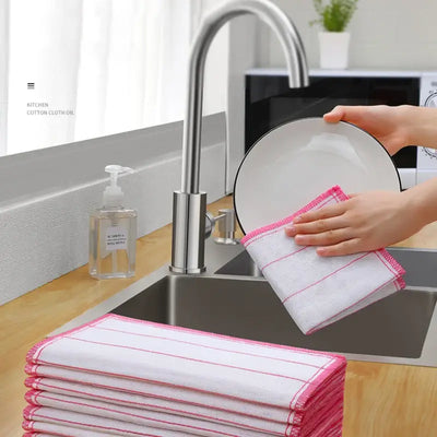 5Pcs cotton kitchen towels stacked by a sink, showcasing absorbent dishcloth in use with a dish.