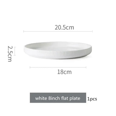 Elegant black porcelain plates with gold rim finish.