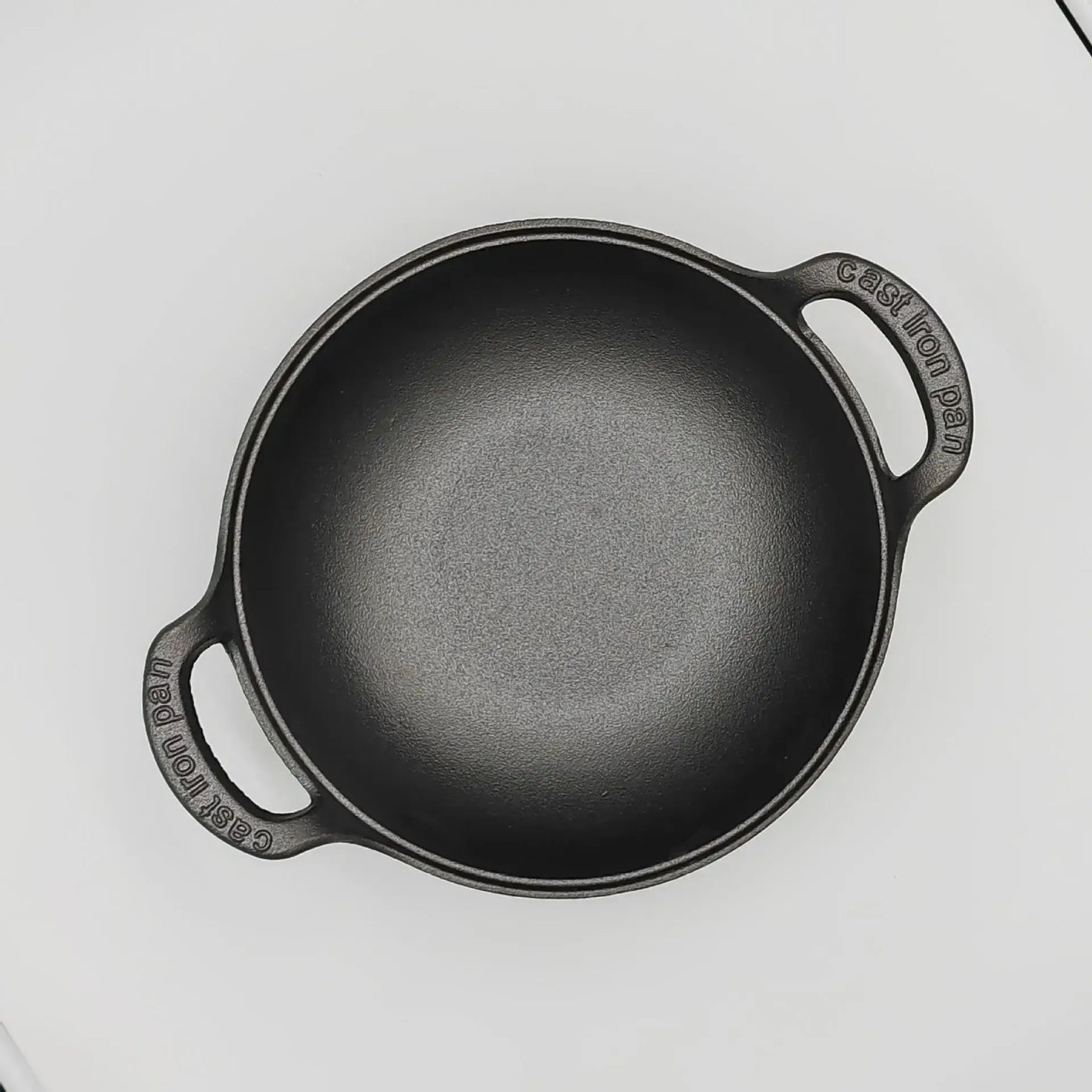 Durable cast iron stew pot with double handles—perfect for soups, stews, and stir-fries. Even heat, non-stick cooking without coating.