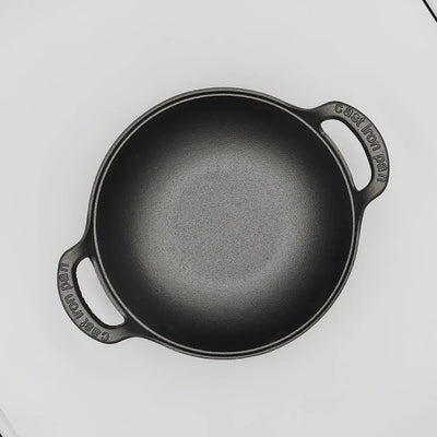 Durable cast iron stew pot with double handles—perfect for soups, stews, and stir-fries. Even heat, non-stick cooking without coating.